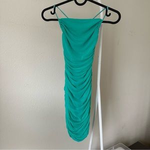 Oh Polly No Angel Cross Back Ruched Mesh Mini Dress in Turquoise
